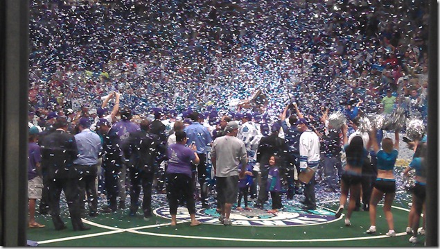 Players, cheerleaders, families, and confetti